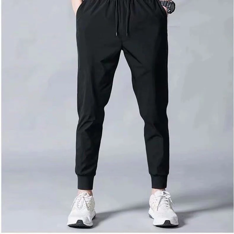 European and American new men's fashion trend casual sports trousers all-match drawstring trousers 
European and American new men's fashion trend casual sports trousers all-match drawstring trousers