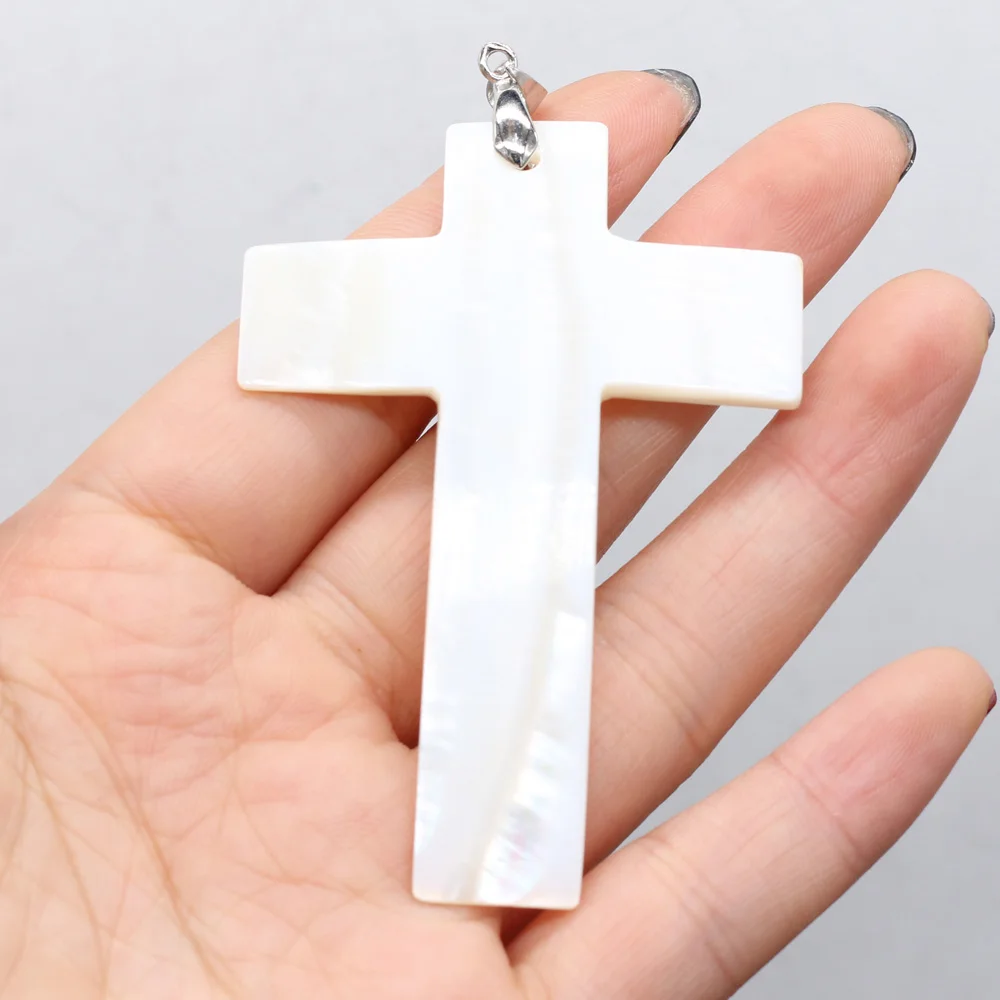 New Natural Shell Pendant Cross Shape White Pearl Shell Pendant Charms for Making DIY Jewelry Necklace Gift Size 50x70mm
New Natural Shell Pendant Cross Shape White Pearl Shell Pendant Charms for Making DIY Jewelry Necklace Gift Size 50x70mm