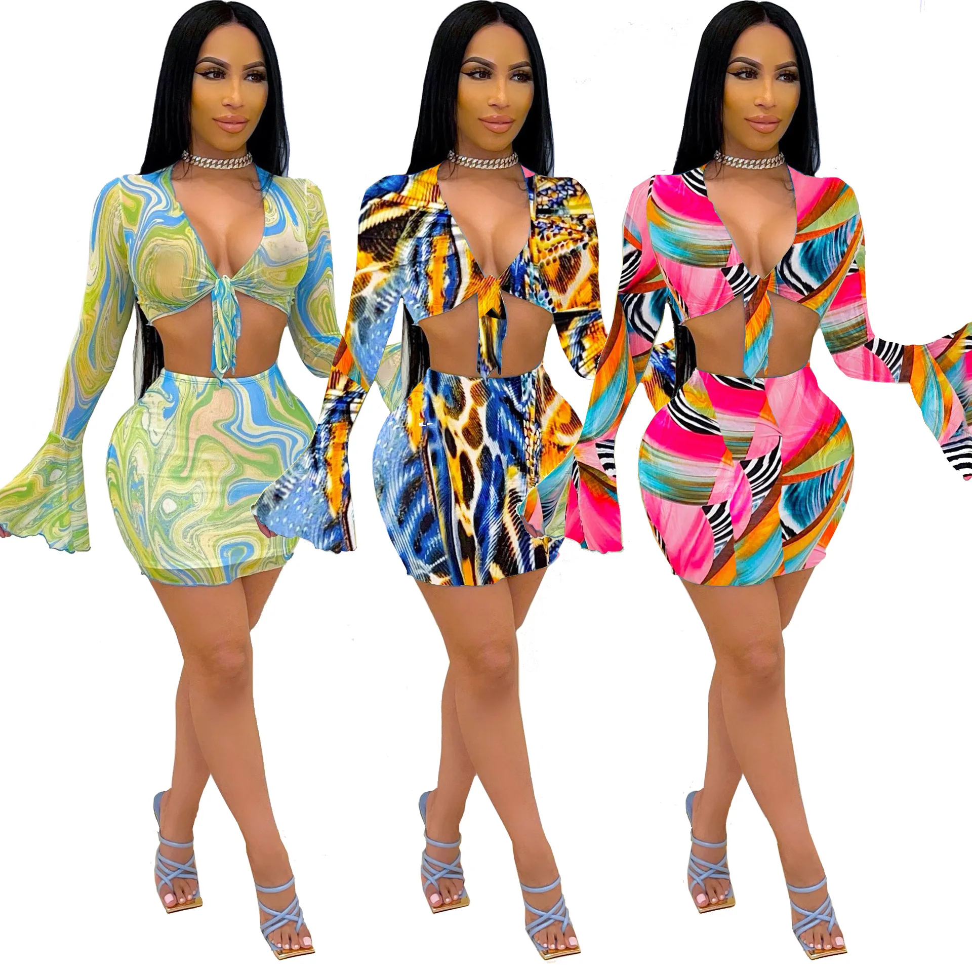 Sexy Sheer Mesh Two Piece Skirt Set Long Falre Sleeve Tie Crop Top Mini Skirt Suit Night Club Transparent Women Clothing 2021
Sexy Sheer Mesh Two Piece Skirt Set Long Falre Sleeve Tie Crop Top Mini Skirt Suit Night Club Transparent Women Clothing 2021