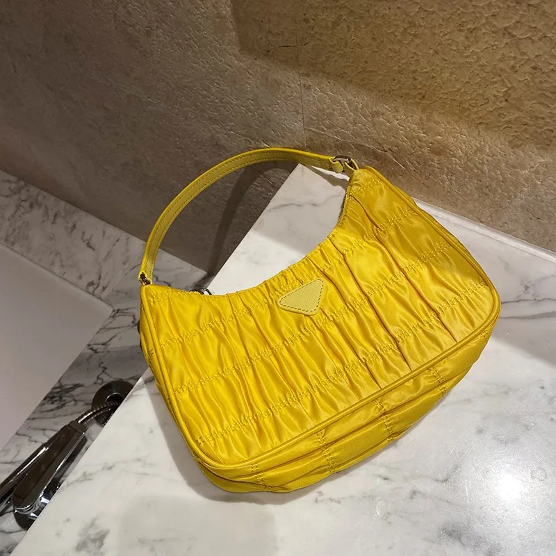 2021 Women Party Armpit Bag Fashion Summer Candy Colour Pleated Nylon Small Bags Ladies Retro Elegant Single Shoulder Saddle Bag
2021 Women Party Armpit Bag Fashion Summer Candy Colour Pleated Nylon Small Bags Ladies Retro Elegant Single Shoulder Saddle Bag