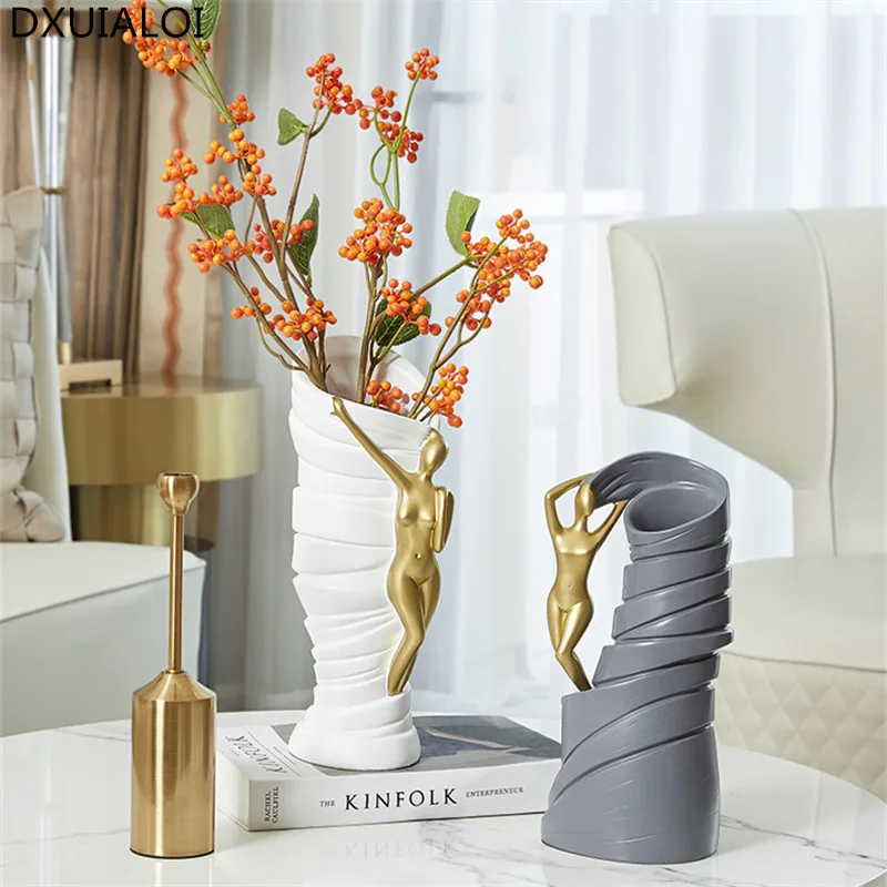 Nordic Light Luxury Art Vase Decoration Modern Simple Creative Flower vases Arrangement Flower Home Decoration Resin Crafts
Nordic Light Luxury Art Vase Decoration Modern Simple Creative Flower vases Arrangement Flower Home Decoration Resin Crafts