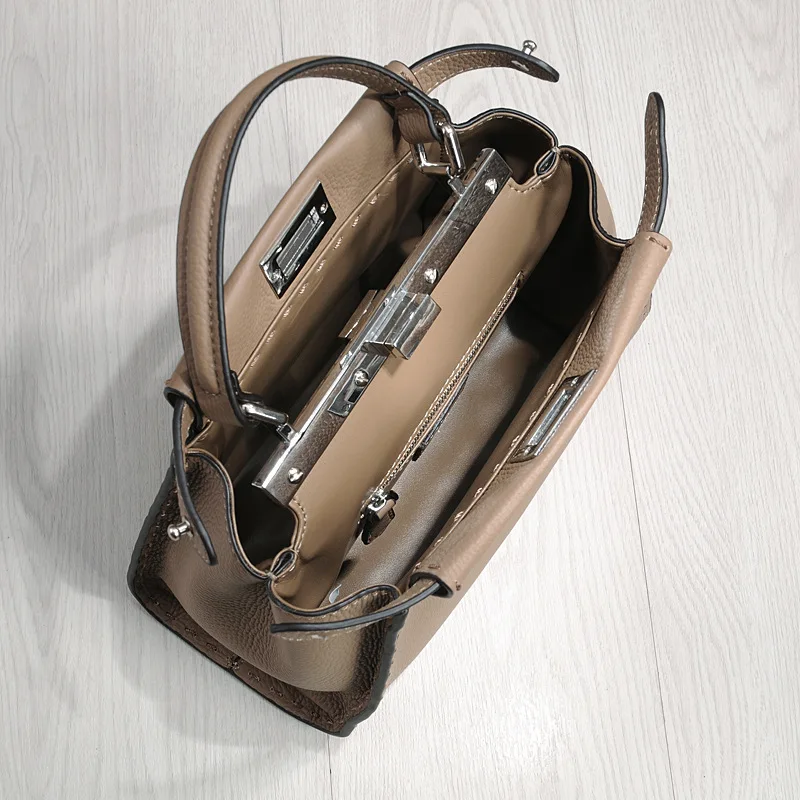 New Hand-Stitched Kitten Stitching Fashion All-Match Genuine Leather Bag Trend One Shoulder Cowhide Women Handbags
New Hand-Stitched Kitten Stitching Fashion All-Match Genuine Leather Bag Trend One Shoulder Cowhide Women Handbags