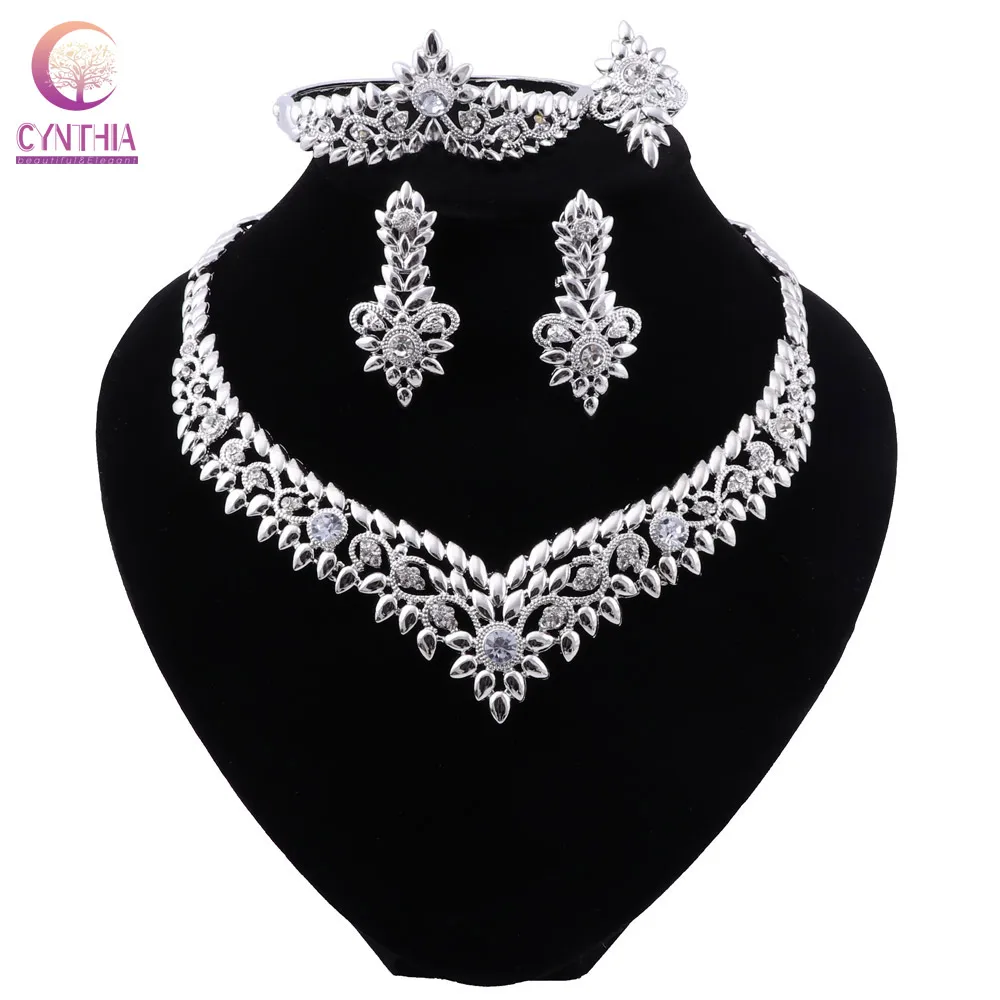 CYNTHIA нигерийские Свадебные Женские аксессуары ювелирные изделия оптовая продажа заявление бренд комплект ювелирных изделий Дубай серебря... 
CYNTHIA нигерийские Свадебные Женские аксессуары ювелирные изделия оптовая продажа заявление бренд комплект ювелирных изделий Дубай серебря...