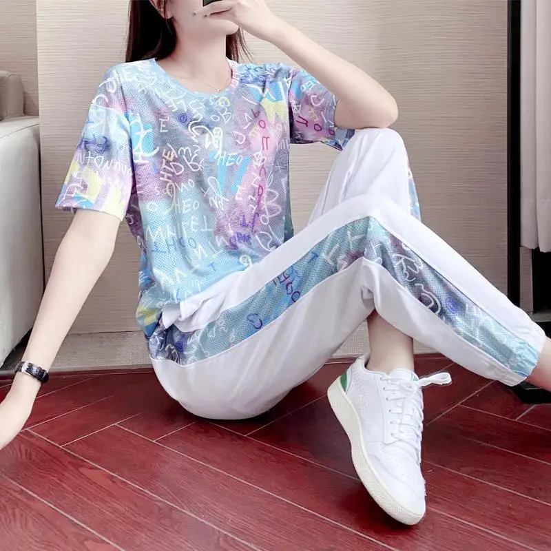 Sports Set Women Casual Summer 2021 New Fashion Thin Korean Version Loose Large Size Short-Sleeved Trousers
Sports Set Women Casual Summer 2021 New Fashion Thin Korean Version Loose Large Size Short-Sleeved Trousers
