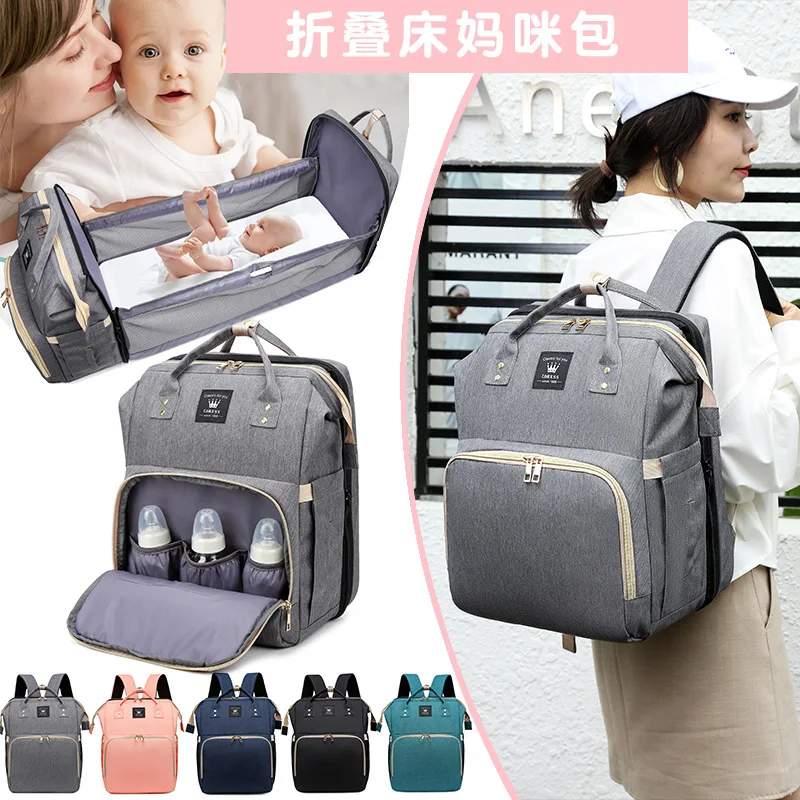 Qyahlybz upgraded mummy shoulder bag multipurpose folding crib mommy backpack casual female travel backpacks women's bags 2021
Qyahlybz upgraded mummy shoulder bag multipurpose folding crib mommy backpack casual female travel backpacks women's bags 2021