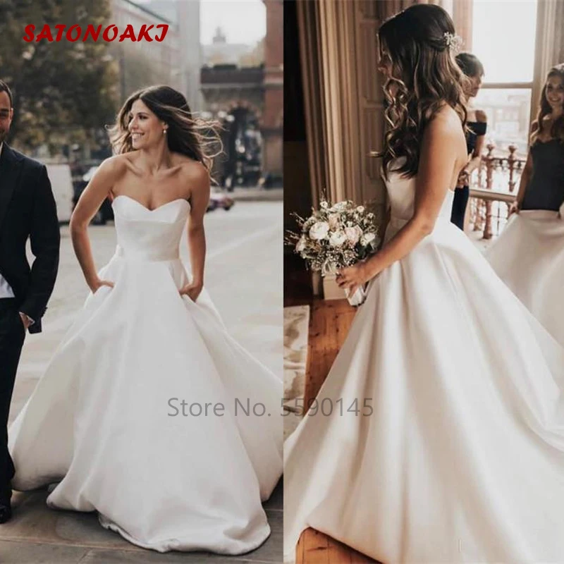 Милая 2020 атласная скромные ТРАПЕЦИЕВИДНОЕ свадебное платье со шлейфом средней длины Сад пляжные свадебные платья размера плюс Vestido De Novia Ин...
Милая 2020 атласная скромные ТРАПЕЦИЕВИДНОЕ свадебное платье со шлейфом средней длины Сад пляжные свадебные платья размера плюс Vestido De Novia Ин...