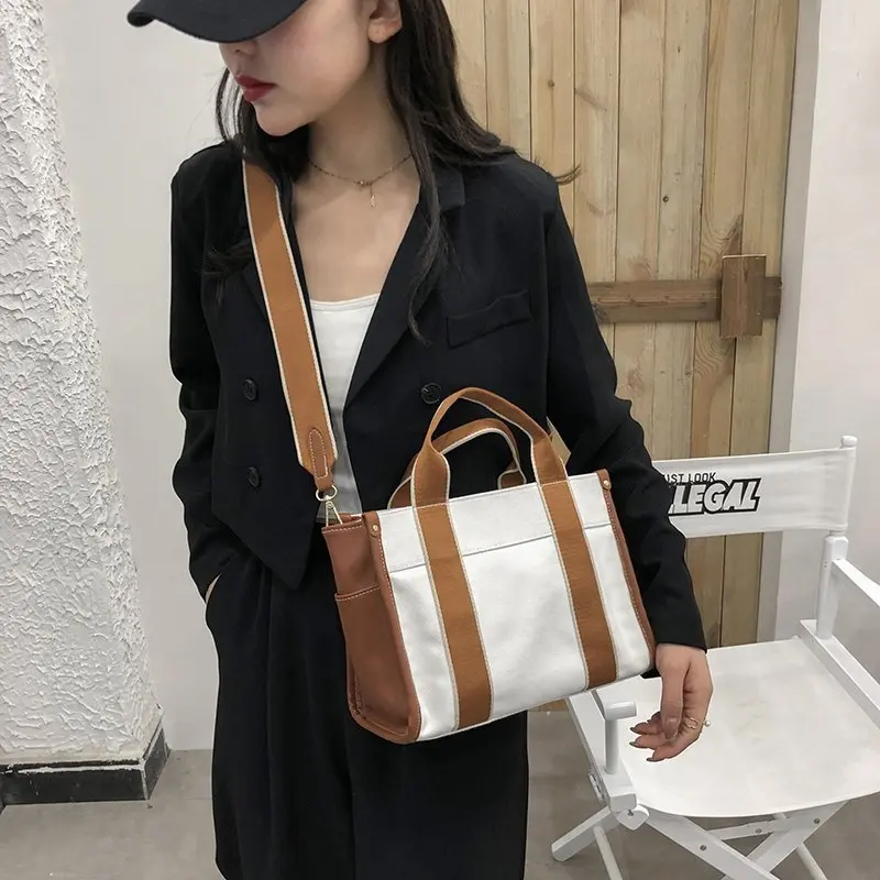 Japanese Canvas Bag Female Messenger Bag 2021 New Fashion Versatile Ins Student Shoulder Bag Fashion Portable Canvas Bag
Japanese Canvas Bag Female Messenger Bag 2021 New Fashion Versatile Ins Student Shoulder Bag Fashion Portable Canvas Bag