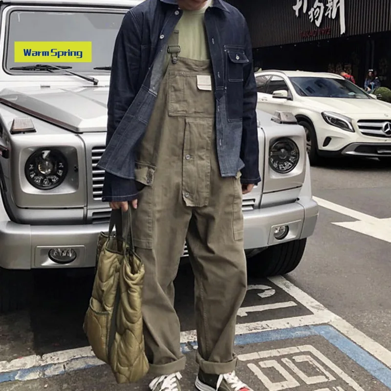 Fashion Streetwear Men Fashion Design Suspender Jumpsuit Loose Straight Pocket Bib Men's Overalls Casual Trousers Jumpsuit
Fashion Streetwear Men Fashion Design Suspender Jumpsuit Loose Straight Pocket Bib Men's Overalls Casual Trousers Jumpsuit