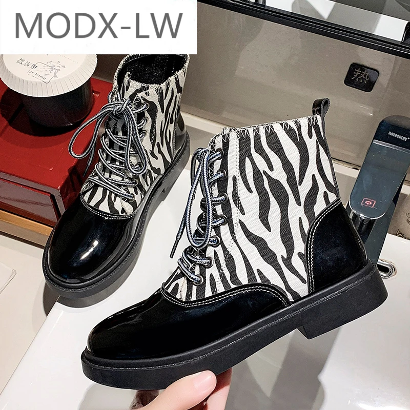 Zebra pattern thick-soled nude boots women's round toe thick heel lace cross lace Martin boots spring and autumn women's shoes
Zebra pattern thick-soled nude boots women's round toe thick heel lace cross lace Martin boots spring and autumn women's shoes