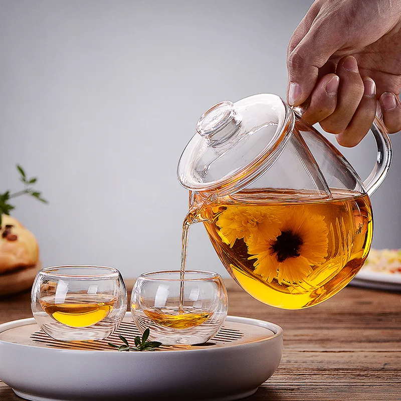 Heat Resistant Glass Tea Pot And Cup Set Chinese Kung Fu Tea Set Flower Teapot Kettle mug Glass Teapot With Filter Puer Tea
Heat Resistant Glass Tea Pot And Cup Set Chinese Kung Fu Tea Set Flower Teapot Kettle mug Glass Teapot With Filter Puer Tea