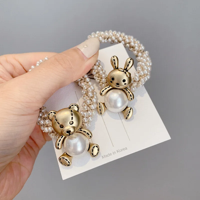 South Korea new children's hair accessories headdress alloy pearl cartoon bear hair circle girl's ball scalp tendon hair rope
South Korea new children's hair accessories headdress alloy pearl cartoon bear hair circle girl's ball scalp tendon hair rope