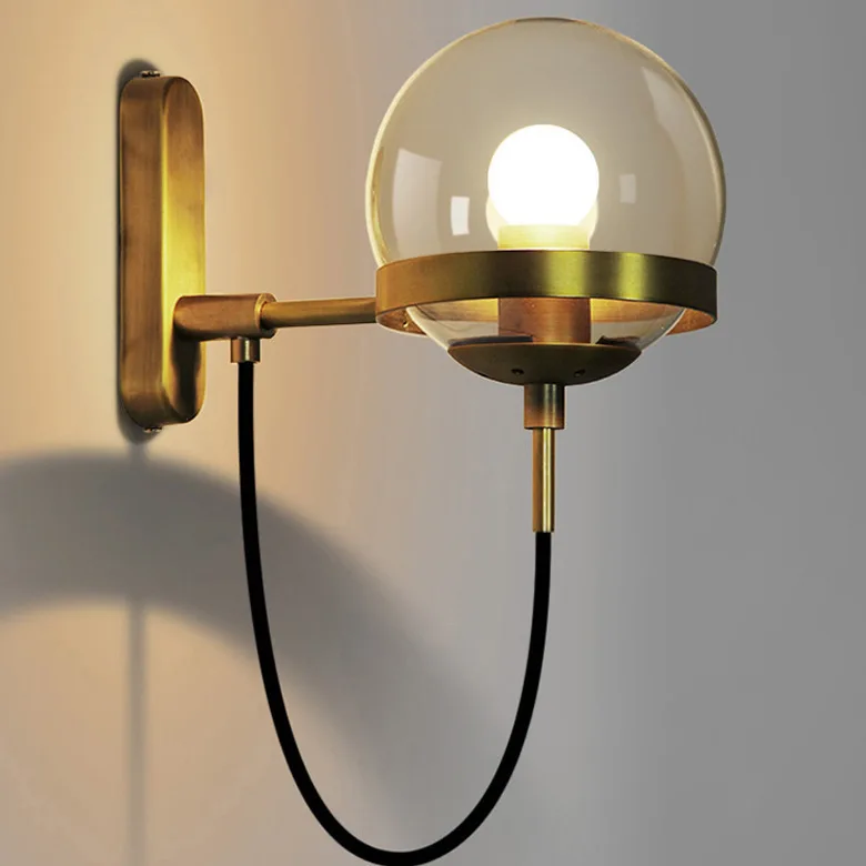 Nordic glass ball wall lamp retro restaurant minimalist hotel bedside lamp industrial wind modern circle wrought iron wall lamp.
Nordic glass ball wall lamp retro restaurant minimalist hotel bedside lamp industrial wind modern circle wrought iron wall lamp.