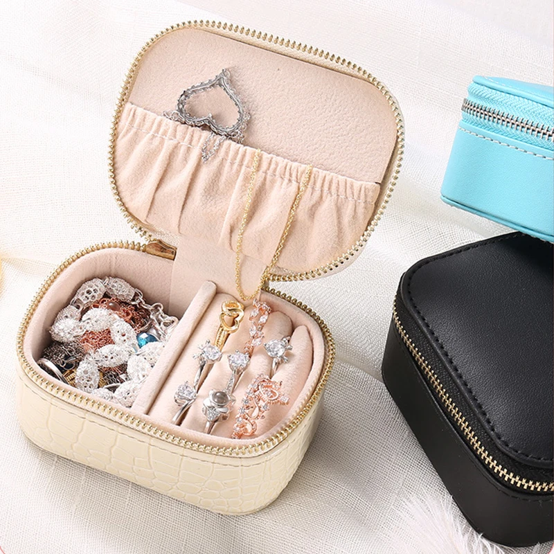 Portable Jewelry Ornaments Organizer Case Small Earrings Ring Necklace Display Storage Jewellery Bag with Zipper
Portable Jewelry Ornaments Organizer Case Small Earrings Ring Necklace Display Storage Jewellery Bag with Zipper