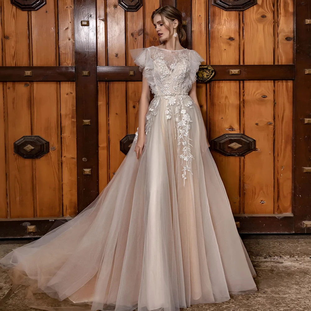 2021 Champagne A Line Wedding Dresses Scoop Ruffles Sleeveless Lace Appliques Button Bridal Wedding Gowns
2021 Champagne A Line Wedding Dresses Scoop Ruffles Sleeveless Lace Appliques Button Bridal Wedding Gowns