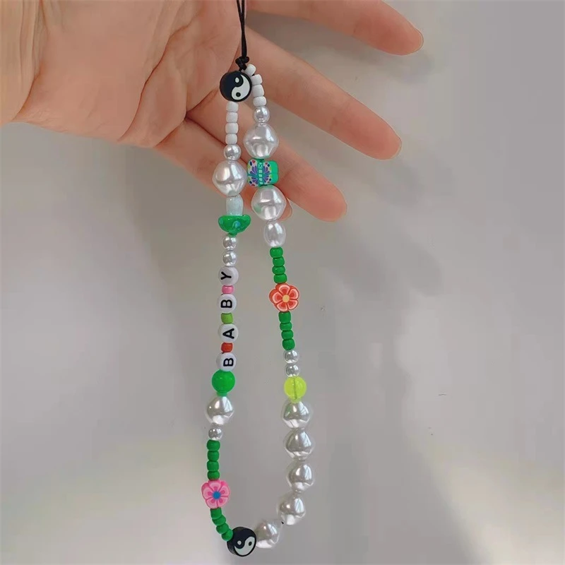 Innovative Soft Pottery Flower Green Rice Beads Irregular Imitation Pearl Yin And Yang Figure Women's Mobile Phone Chain Jewelry
Innovative Soft Pottery Flower Green Rice Beads Irregular Imitation Pearl Yin And Yang Figure Women's Mobile Phone Chain Jewelry
