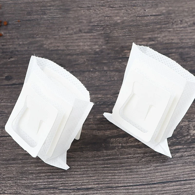 50 Pcs/bag Disposable Hanging Ear Coffee Filter Paper Portable Non-woven Coffee Filter Safe and Environmental Coffee Paper Bag
50 Pcs/bag Disposable Hanging Ear Coffee Filter Paper Portable Non-woven Coffee Filter Safe and Environmental Coffee Paper Bag