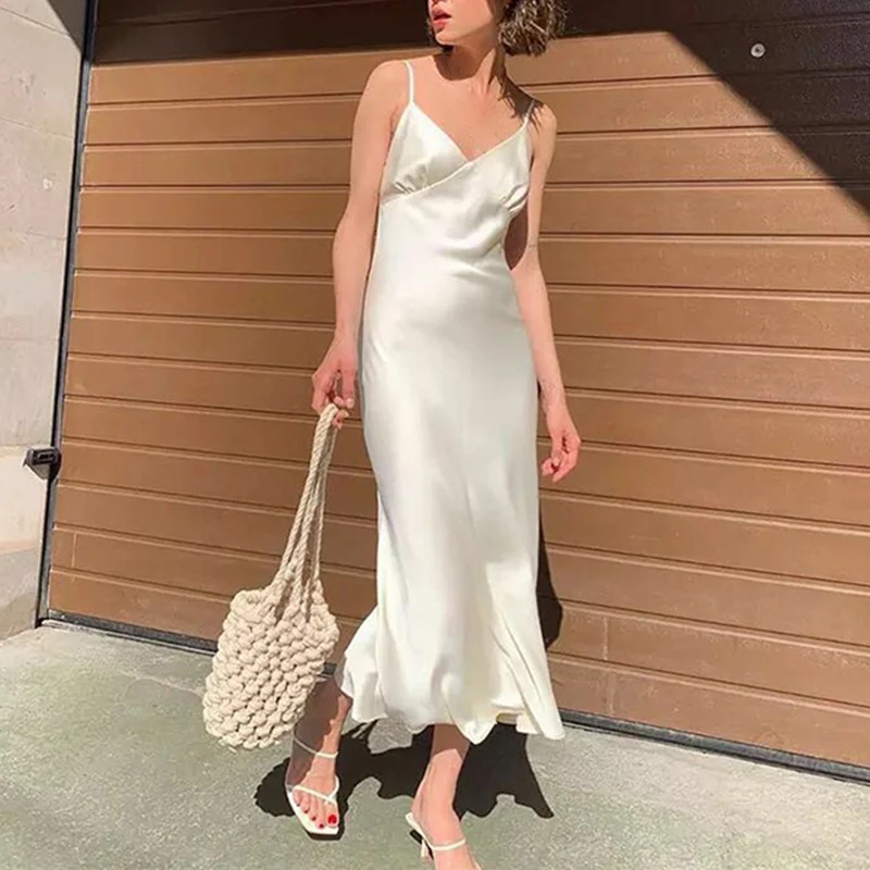 Women Sleeveless Suspender Dress Backless Sexy Party Elegant Summer Dress 2021 V Neck Solid Color Slim Dress
Women Sleeveless Suspender Dress Backless Sexy Party Elegant Summer Dress 2021 V Neck Solid Color Slim Dress