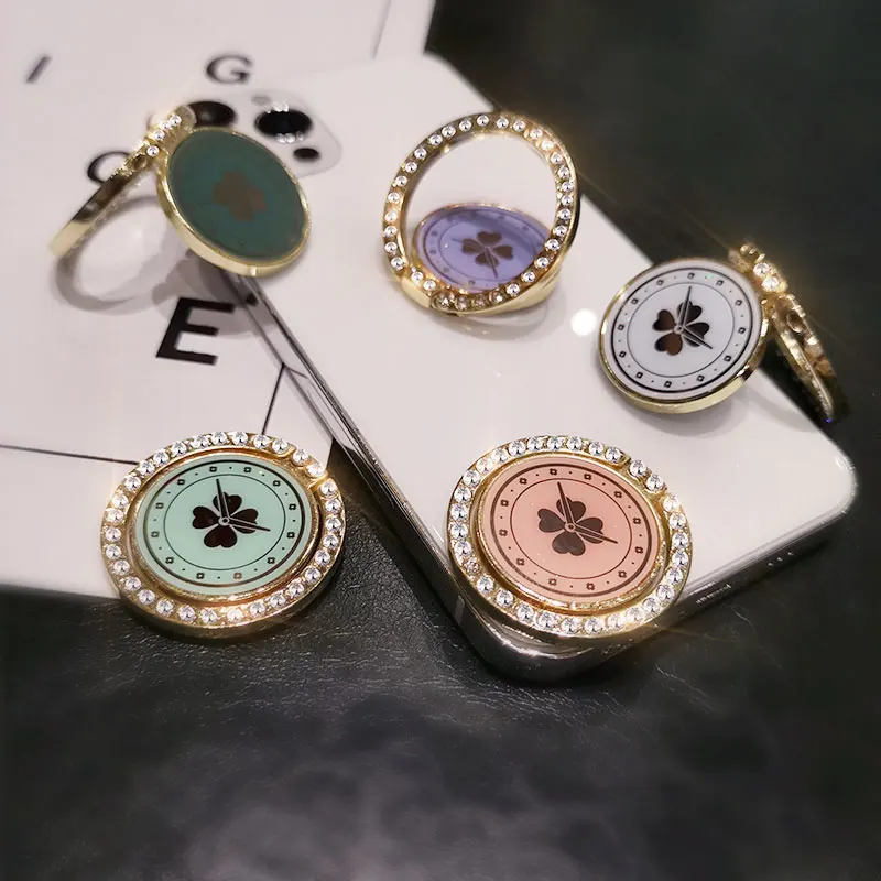 Fourleaf Clover Diamond Bracket Luxury Rotatable Finger Ring Mobile Phone Holder Stand Grip for Universal Car Phone Back Sticker
Fourleaf Clover Diamond Bracket Luxury Rotatable Finger Ring Mobile Phone Holder Stand Grip for Universal Car Phone Back Sticker