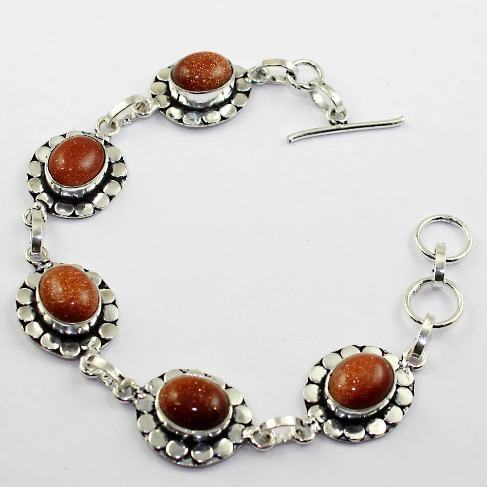 Sun Stone Bracelet Silver Overlay over Copper , 19.2cm, B1221
Sun Stone Bracelet Silver Overlay over Copper , 19.2cm, B1221