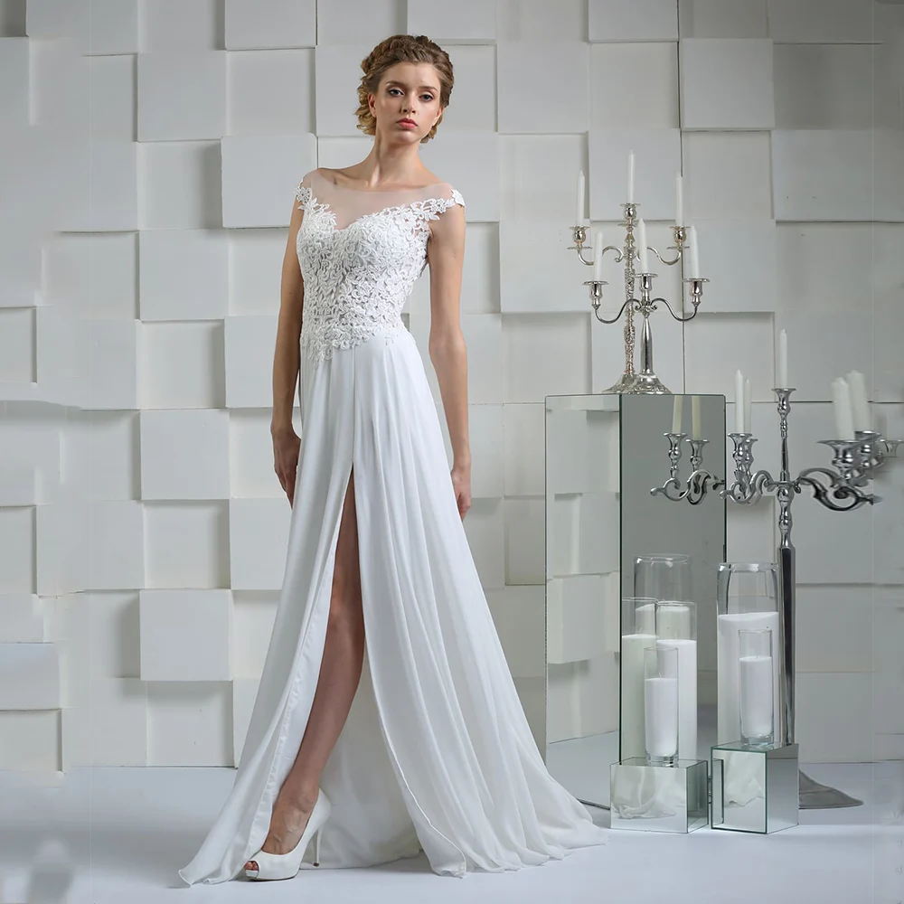 Charming Wedding Dresses Chiffon Appliques Slide Split Sleeveless Covered Button A-Line Bridal Gowns Novia Do 2021
Charming Wedding Dresses Chiffon Appliques Slide Split Sleeveless Covered Button A-Line Bridal Gowns Novia Do 2021