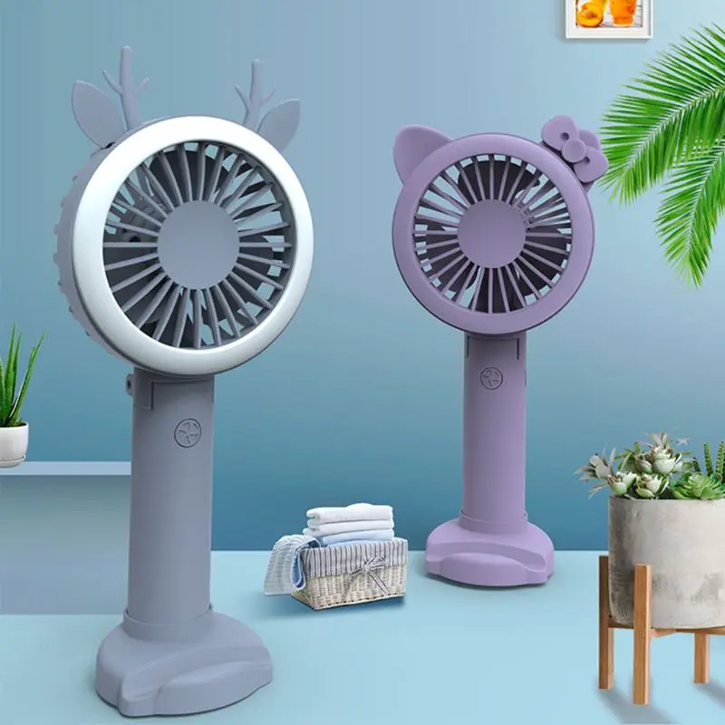Handheld USB Rechargeable Fans with LED Light Portable Air Cooling Fan Cute Mini Desktop Air Fan
Handheld USB Rechargeable Fans with LED Light Portable Air Cooling Fan Cute Mini Desktop Air Fan