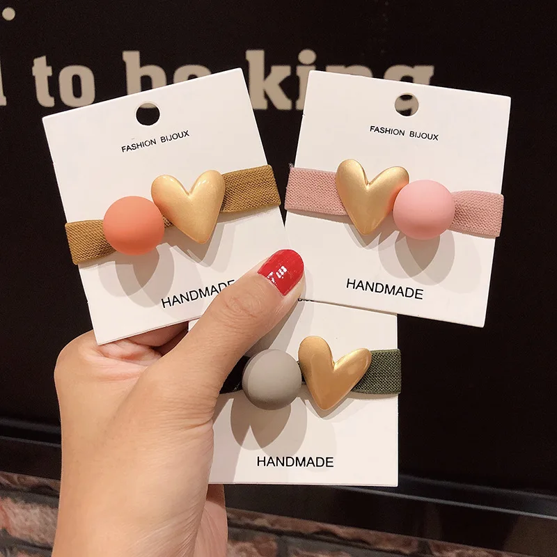 1pcs Women Girls Simple Hair Rope Head Rope Rubber Color Ball Ball Hair Ring Metal Love Rubber Band Hair Jewelry
1pcs Women Girls Simple Hair Rope Head Rope Rubber Color Ball Ball Hair Ring Metal Love Rubber Band Hair Jewelry