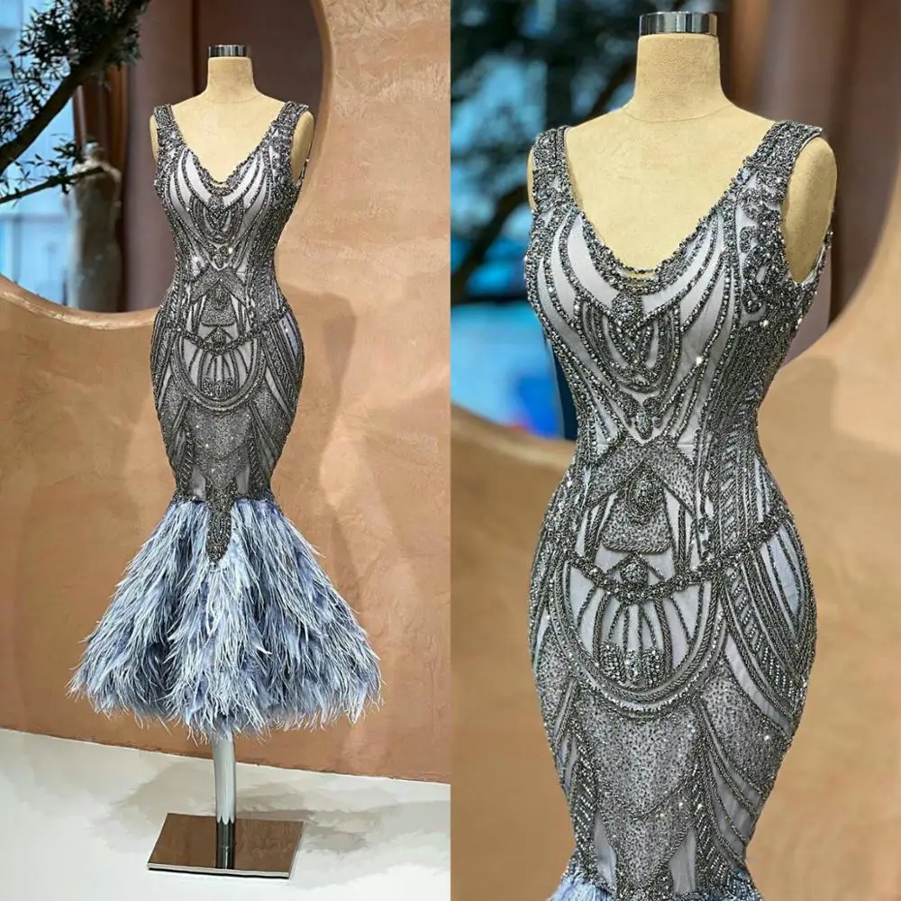 V Neck Beading Mermaid Prom Dresses Feather Skirt Luxury Crystal Party Celebrity Gowns Handmade Evening Party Dress
V Neck Beading Mermaid Prom Dresses Feather Skirt Luxury Crystal Party Celebrity Gowns Handmade Evening Party Dress