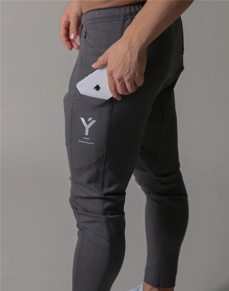 2020 New Gyms Pants Men Pantalon Homme Streetwear Jogger Fitness Bodybuilding Pants Pantalones Hombre Sweatpants Trousers Men
2020 New Gyms Pants Men Pantalon Homme Streetwear Jogger Fitness Bodybuilding Pants Pantalones Hombre Sweatpants Trousers Men