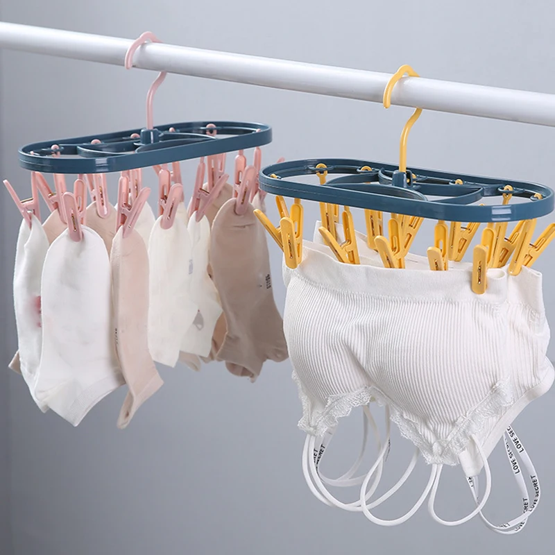 Home Oval Drying Rack Socks Underwear Hanger Foldable Clothes Drying Rack with 12Clothespins for Balcony KSI999 
Home Oval Drying Rack Socks Underwear Hanger Foldable Clothes Drying Rack with 12Clothespins for Balcony KSI999