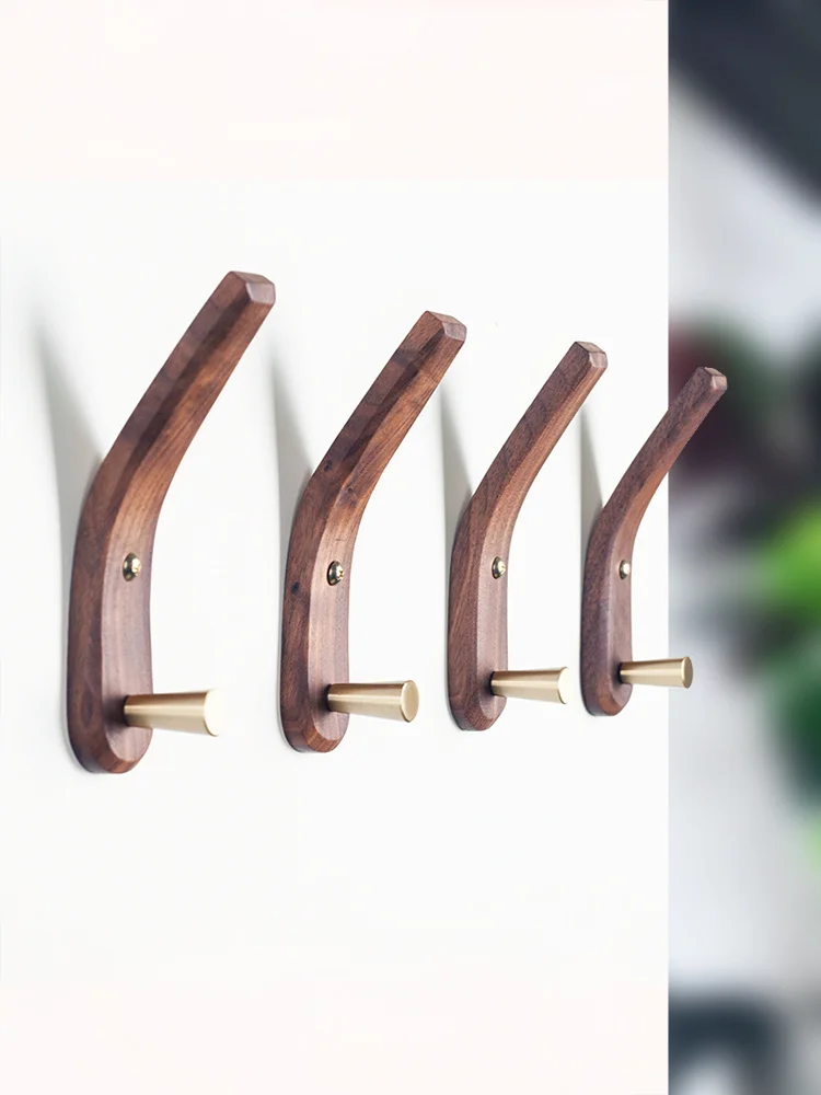 Nordic solid wood clothes hooks in the entrance hallway wall clothes hooks creative brass wooden hangers
Nordic solid wood clothes hooks in the entrance hallway wall clothes hooks creative brass wooden hangers