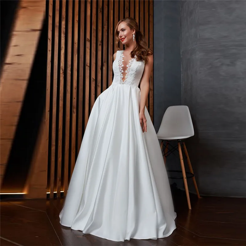 Кружевное свадебное платье-трапеция с аппликацией, на пуговицах, без рукавов, плиссированное, 2021
Кружевное свадебное платье-трапеция с аппликацией, на пуговицах, без рукавов, плиссированное, 2021