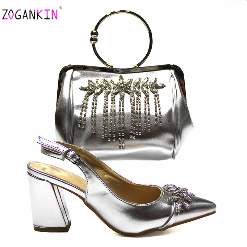 Summer New Design Nigerian Women Shoes and Bag Set in Silver Color Pointed Toe Italian Women Shoes and Bag Set for Wedding
Summer New Design Nigerian Women Shoes and Bag Set in Silver Color Pointed Toe Italian Women Shoes and Bag Set for Wedding