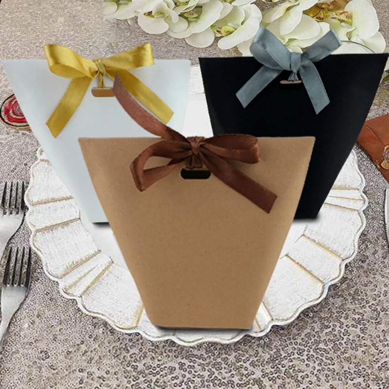 50Pcs Favor Box Candy Boxes Kraft Paper Wedding Favors Favor GiftsBox With Ribbon Travel Baby Shower Present Boxes Party Decor
50Pcs Favor Box Candy Boxes Kraft Paper Wedding Favors Favor GiftsBox With Ribbon Travel Baby Shower Present Boxes Party Decor