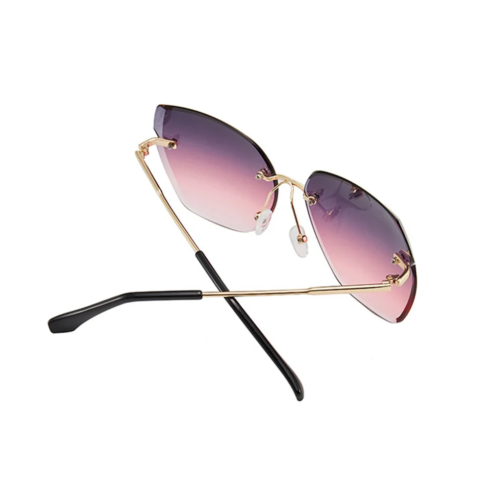 Brand Designer Frameless Sunglasses Women Cat eyewear UV400 gafas de sol Oversized Sun glasses Vintage Alloy Legs oculos de sol 
Brand Designer Frameless Sunglasses Women Cat eyewear UV400 gafas de sol Oversized Sun glasses Vintage Alloy Legs oculos de sol