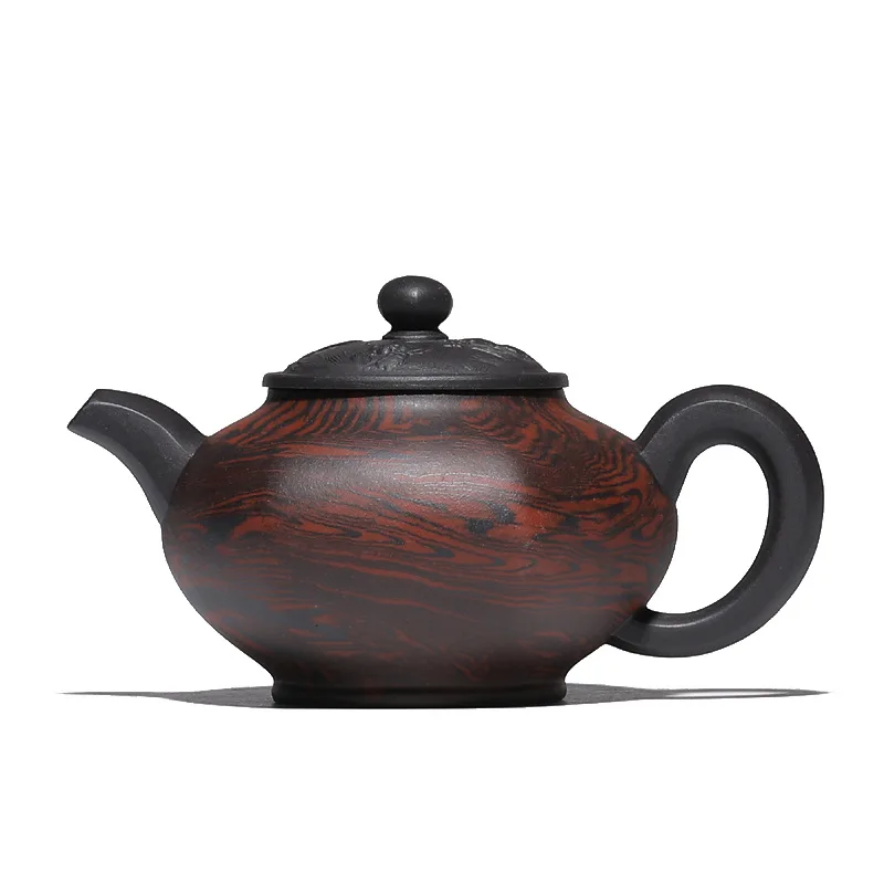 Yixing famous original mine old purple clay teapot full of handmade gold and jade teapot
Yixing famous original mine old purple clay teapot full of handmade gold and jade teapot