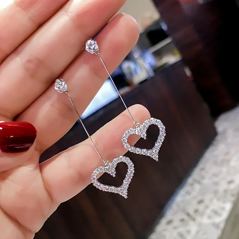 New Silver Color Tassel Long Heart Stud Earrings with Zircon Stone Fashion Jewelry Korean Earrings S925
New Silver Color Tassel Long Heart Stud Earrings with Zircon Stone Fashion Jewelry Korean Earrings S925