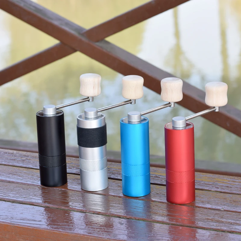 Mini manuaL coffee grinder portable coffee mill household coffee tools Titanium plating stainless steel burr
Mini manuaL coffee grinder portable coffee mill household coffee tools Titanium plating stainless steel burr