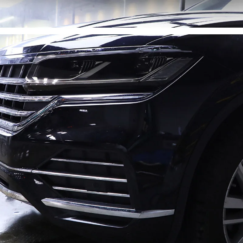 Прозрачная Черная защитная пленка для фар Volkswagen Touareg из ТПУ, устойчивая к царапинам, декоративные наклейки для ламп
Прозрачная Черная защитная пленка для фар Volkswagen Touareg из ТПУ, устойчивая к царапинам, декоративные наклейки для ламп