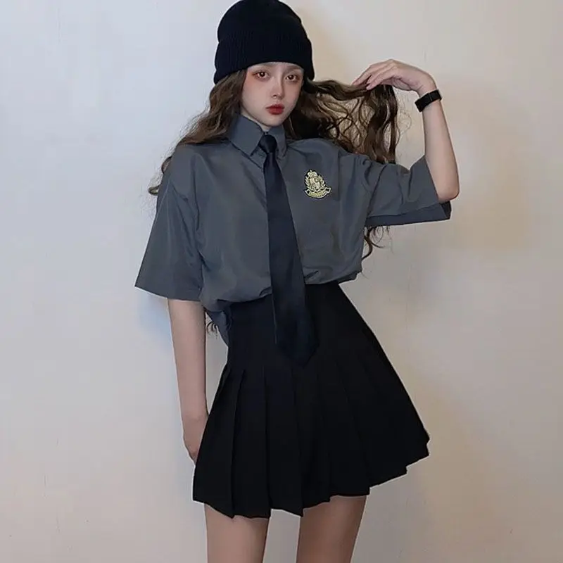 Suit female jk uniform women's set 2021 summer Korean fashion short-sleeved two-piece loose college style shirt pleated skirt
Suit female jk uniform women's set 2021 summer Korean fashion short-sleeved two-piece loose college style shirt pleated skirt