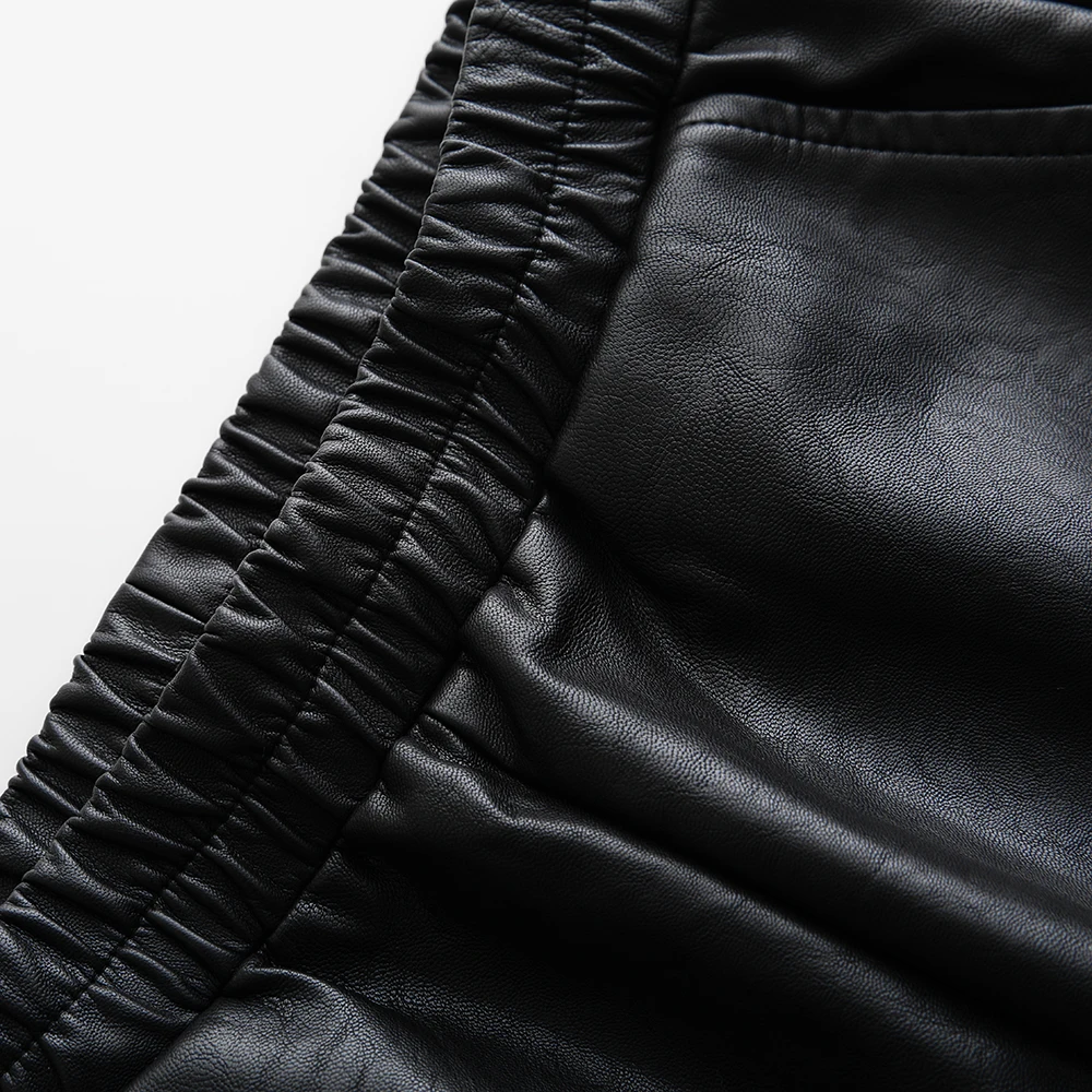 Elastic Waist PU Leather Pants Women Fall Winter New High Waist Loose Cropped Pants Button Fashion Black Leather Trouser
Elastic Waist PU Leather Pants Women Fall Winter New High Waist Loose Cropped Pants Button Fashion Black Leather Trouser