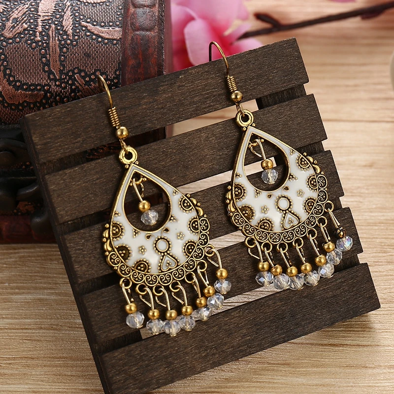 New Women Waterdrop fan-shaped White Bead Tassel Earrings Vintage Dripping Oils Bohemia Earrings European and American Jewelry
New Women Waterdrop fan-shaped White Bead Tassel Earrings Vintage Dripping Oils Bohemia Earrings European and American Jewelry