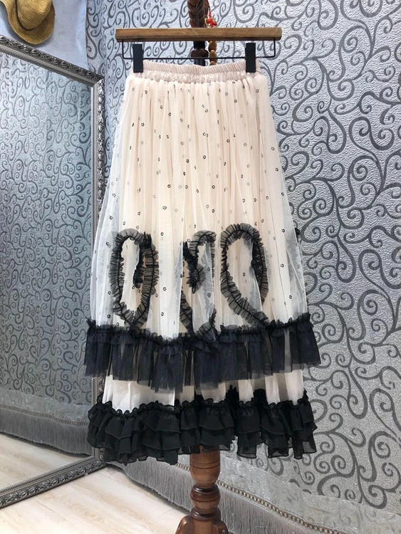 2021 new women fashion elastic waist hem pleated stitching all-match long skirt with wooden ears 609
2021 new women fashion elastic waist hem pleated stitching all-match long skirt with wooden ears 609
