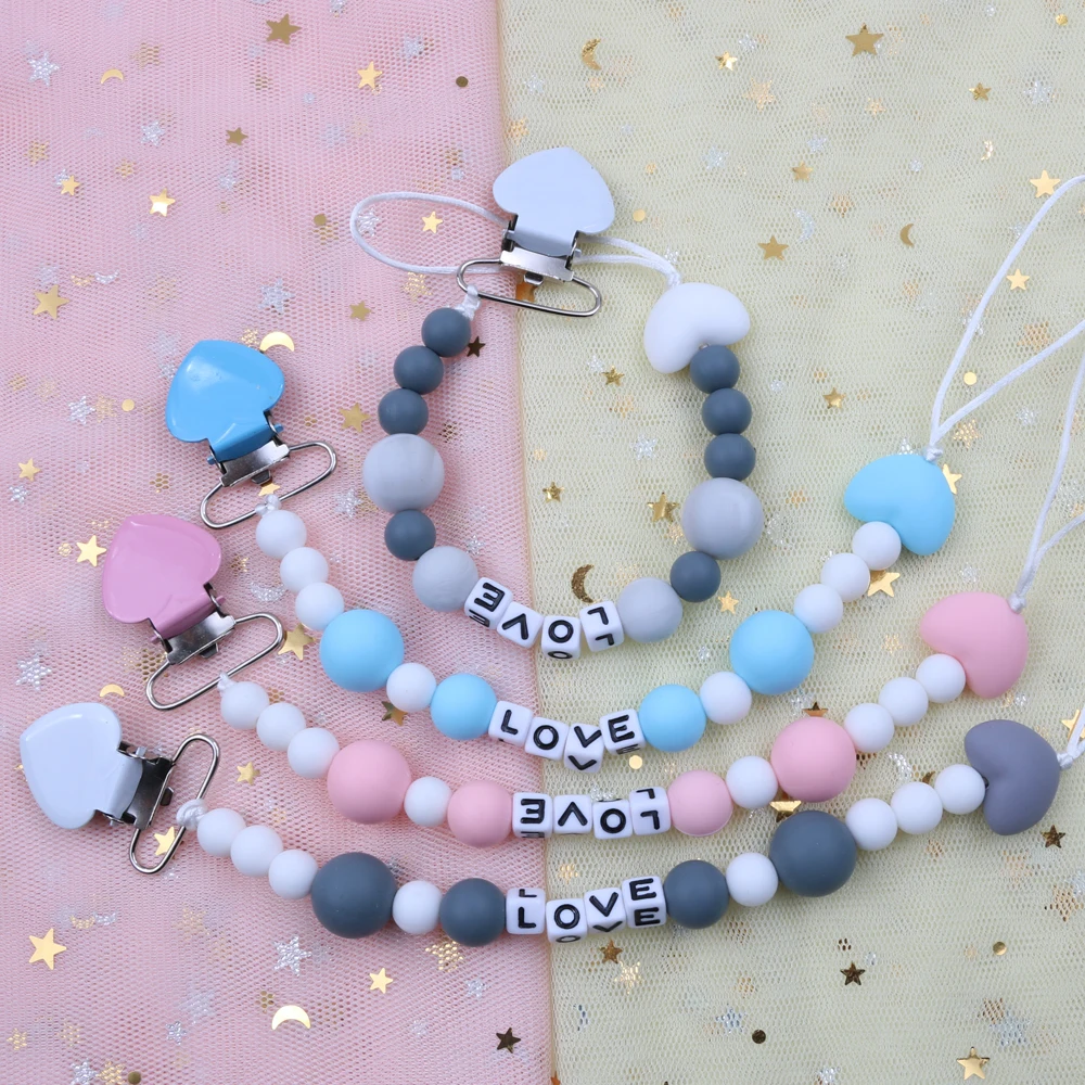 New silicone safety and environmental protection letter models love pacifier clip baby baby shower toy molar toy traction rope b
New silicone safety and environmental protection letter models love pacifier clip baby baby shower toy molar toy traction rope b