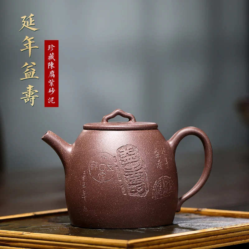 Чайник из фиолетовой глины Yixing, чайник из сырой глины, вырезанный чайник для долголетия, технические товары
Чайник из фиолетовой глины Yixing, чайник из сырой глины, вырезанный чайник для долголетия, технические товары