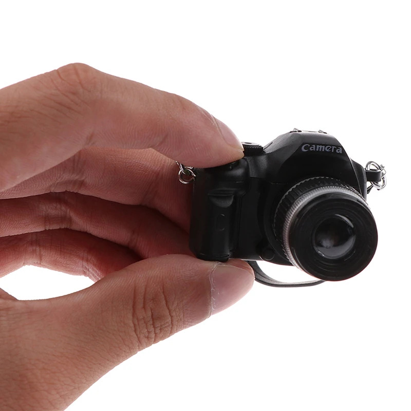1Pc 1/12 Dollhouse Miniature Digital Camera Dolls Accessories DIY Dolls House Decoration Accessory 
1Pc 1/12 Dollhouse Miniature Digital Camera Dolls Accessories DIY Dolls House Decoration Accessory
