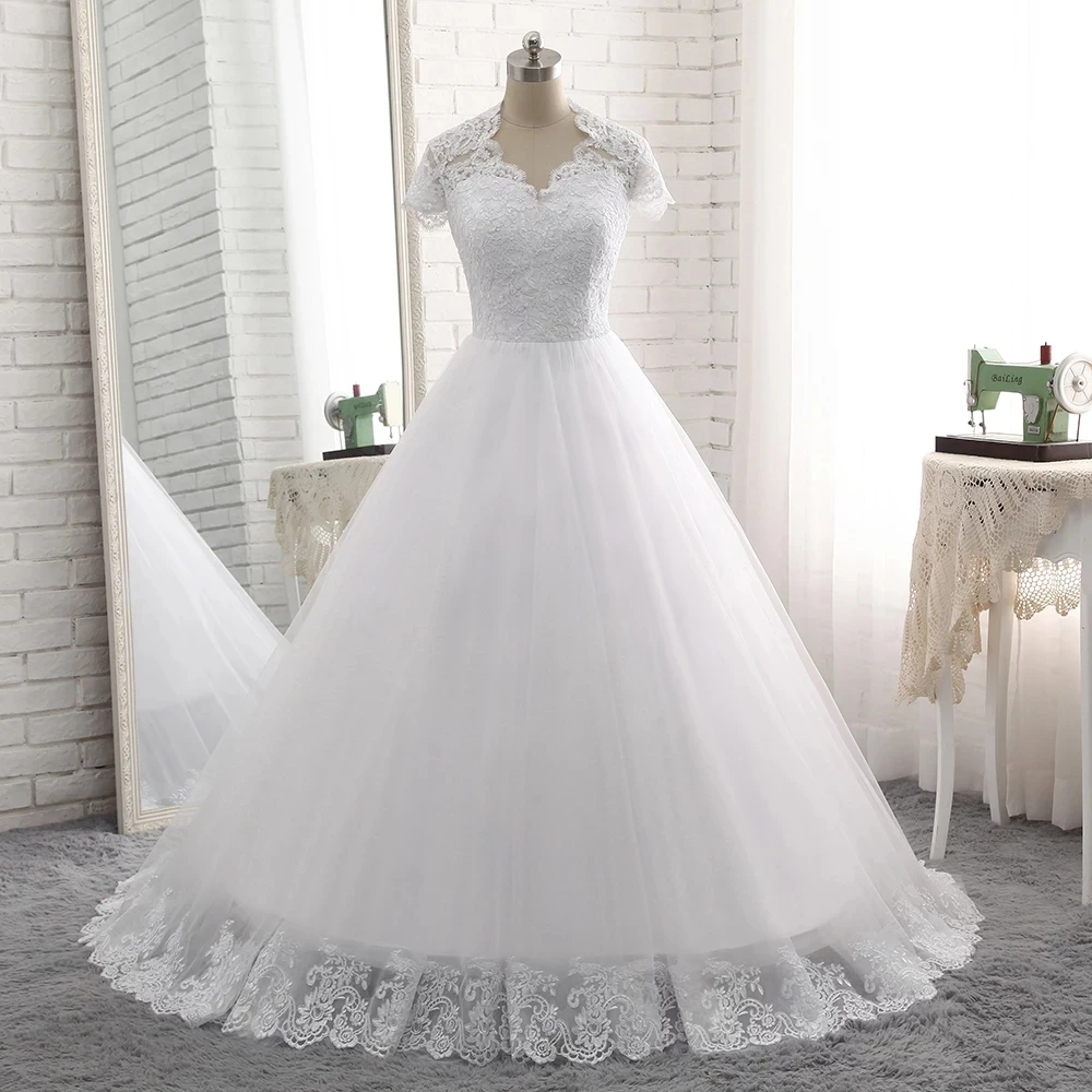 Charming Short Sleeves White Tulle Wedding Dress 2021 Vestidos De Novia See-Through Appliques Zipper Button Combina Bridal Gowns
Charming Short Sleeves White Tulle Wedding Dress 2021 Vestidos De Novia See-Through Appliques Zipper Button Combina Bridal Gowns