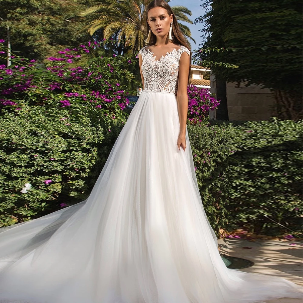 Elegant Tulle O-neck Bridal Gowns Lace Cap Sleeve White Ivory Sweep Ttain Aline Wedding Dresses for Bridal
Elegant Tulle O-neck Bridal Gowns Lace Cap Sleeve White Ivory Sweep Ttain Aline Wedding Dresses for Bridal