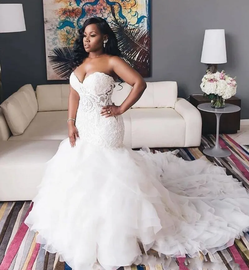 Vintage Ivory 2021 Trumpet Mermaid African Wedding Dresses Sweetheart Lace Bodice Ruffles Lace Up Plus Size Bridal Gown 
Vintage Ivory 2021 Trumpet Mermaid African Wedding Dresses Sweetheart Lace Bodice Ruffles Lace Up Plus Size Bridal Gown