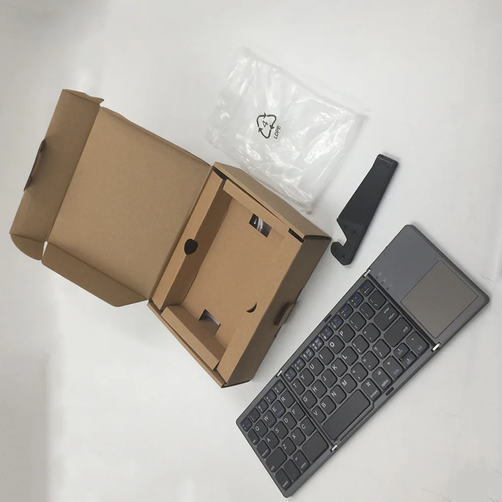 Portable Bluetooth 3.0 Folding Keyboard 64 Keys Mini Foldable Wireless Keypad Universal Bluetooth Keyboard for Tablet Computer
Portable Bluetooth 3.0 Folding Keyboard 64 Keys Mini Foldable Wireless Keypad Universal Bluetooth Keyboard for Tablet Computer