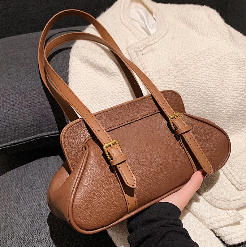 High-quality Ladies Retro Art One-shoulder Shell Bag 2021 New Female Bag Simple Soft Leather Single-shoulder Armpit Female Bag
High-quality Ladies Retro Art One-shoulder Shell Bag 2021 New Female Bag Simple Soft Leather Single-shoulder Armpit Female Bag